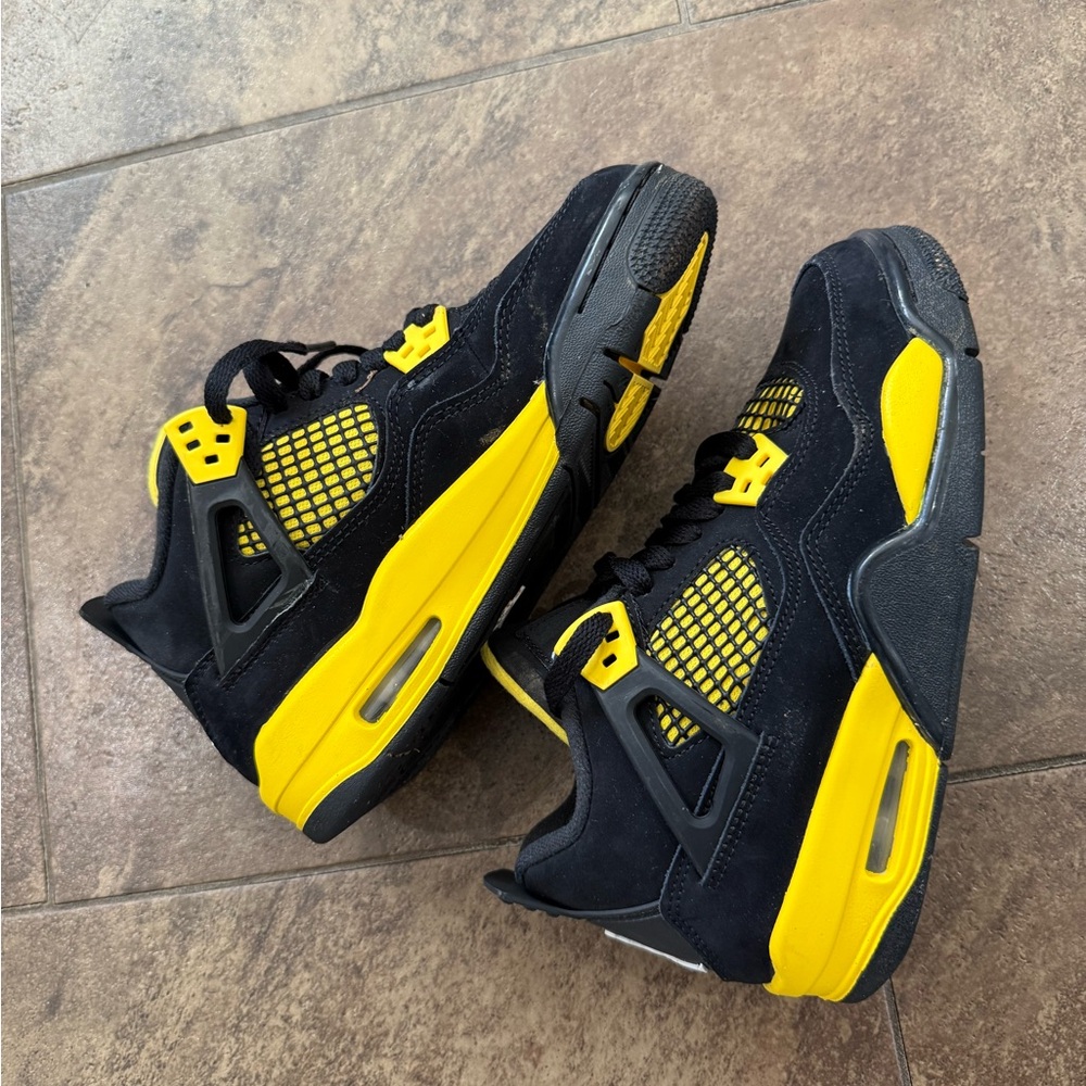 Air Jordan 4 Retro Black and Yellow Sneakers